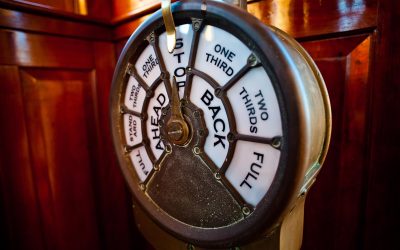 Closeup of an engine order telegraph on display at The Independence Seaport Museum